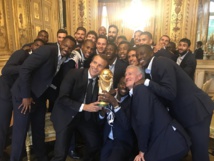 Cheering crowds, smoke and red carpets greet French World Cup heroes Cheering crowds, smoke and red carpets greet French World Cup heroes