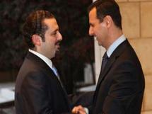 Assad and Saad Al-hariri