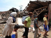 At least 384 dead, 29 missing after Indonesian quakes and tsunami At least 384 dead, 29 missing after Indonesian quakes and tsunami