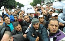 Tunisian protesters camp outside PM's office Tunisian protesters camp outside PM's office