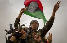 Rebels seize key Libyan town, Obama praises mission Rebels seize key Libyan town, Obama praises mission