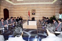 Syria cabinet resigns, Assad to address nation