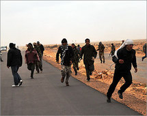 Brega battle rages as another Kadhafi man quits
