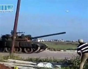 Syrian tanks shell Hama ahead of UN meeting