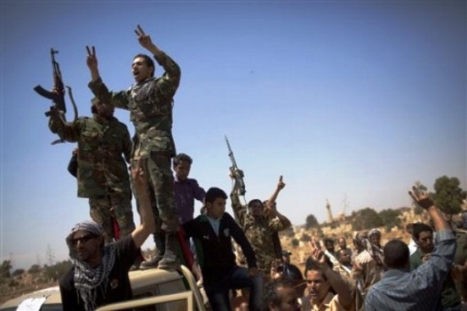 Libya rebels say town captured on path to Tripoli