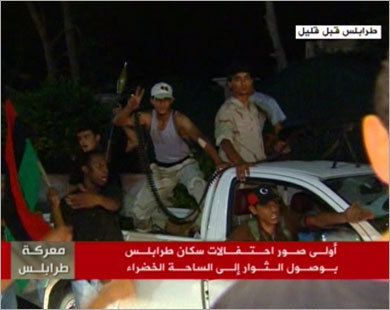 Tripoli erupts in joy as Kadhafi compound falls Tripoli erupts in joy as Kadhafi compound falls