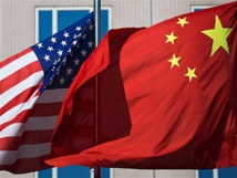 China vows to retaliate against US tariff hikes