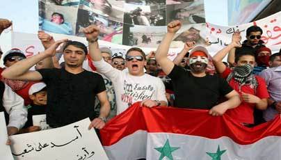 Kadhafi's death spurs Syria protests, 30 killed