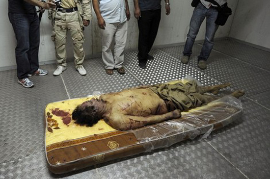 Kadhafi buried in secret, NATO asked to stay on Kadhafi buried in secret, NATO asked to stay on