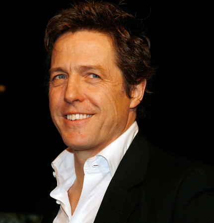 Hugh Grant becomes a dad, but mother's a mystery