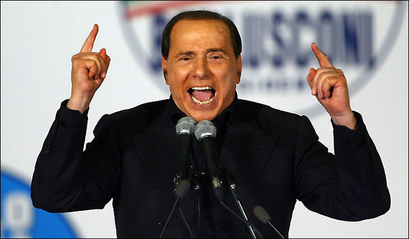Berlusconi compares himself to Mussolini