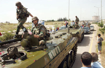 Syria accused of crimes against humanity as 23 killed Syria accused of crimes against humanity as 23 killed