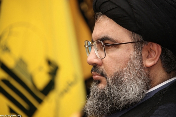 Nasrallah makes rare public show, vows to arm heavily