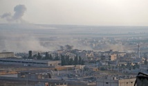 Watchdog: Syrian forces capture key town in rebel enclave