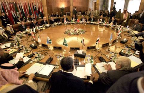 Arab League calls on Assad to cede power, turns to UN