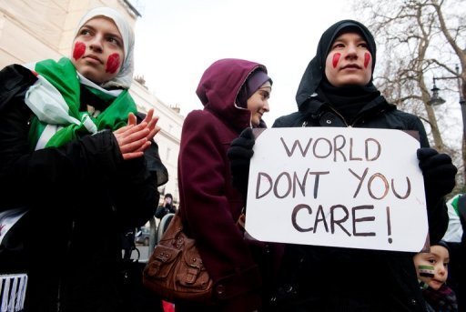 Protesters outside the Syrian embassy in London, on 4th February (AFP/ File, Leon Neal)