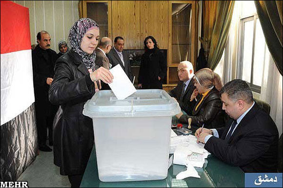 More bloodshed as Syrians vote on new constitution More bloodshed as Syrians vote on new constitution