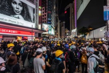 Hong Kong strike devolves into violence after protester is shot Hong Kong strike devolves into violence after protester is shot