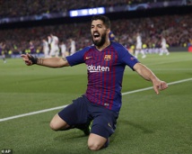uarez return boosts Barcelona's delayed title bid