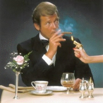 Ex-007 Roger Moore 'beaten up by first two wives' Ex-007 Roger Moore 'beaten up by first two wives'