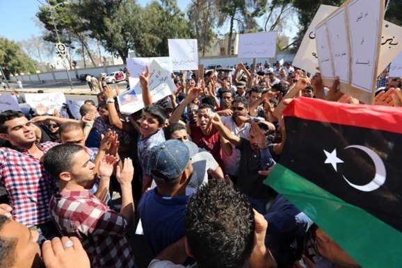 Fighters angry at cabinet besiege Libya assembly Fighters angry at cabinet besiege Libya assembly