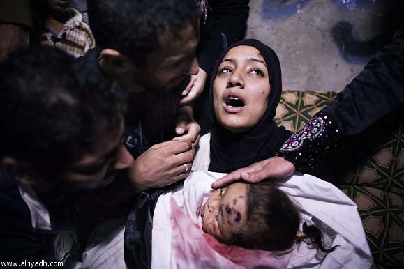 Israeli Gaza raids continue, hitting media centre