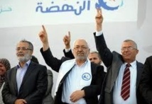 Tunisia's Ennahda says may quit in boost for PM