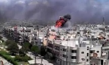 Regime shells Damascus, air raids in Hama Regime shells Damascus, air raids in Hama