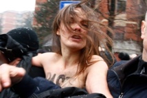 Femen women held in Arab world's first topless protest Femen women held in Arab world's first topless protest
