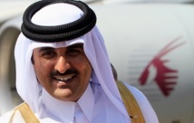 New Qatar emir extends hand to 'all', replaces PM