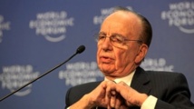 Murdoch recalled by British lawmakers over police comments Murdoch recalled by British lawmakers over police comments