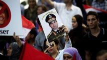 Egypt army chief urges rallies, Islamists warn of war