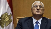 Egypt's Mansour says committed to election timetable