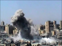 Syria blast kills 21, US presses opposition on peace talks