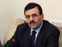 Tunisia PM says committed to 'principle' of resigning Tunisia PM says committed to 'principle' of resigning