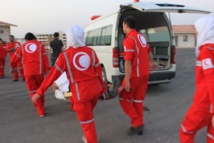 Red Crescent delivers aid to Homs despite coming under attack Red Crescent delivers aid to Homs despite coming under attack