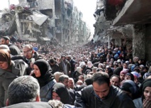 Syria's besieged Yarmuk gets UN aid after two-week halt Syria's besieged Yarmuk gets UN aid after two-week halt