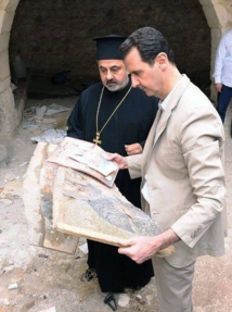 Syria's Assad pays Easter visit to old Christian town Syria's Assad pays Easter visit to old Christian town