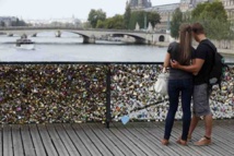 'Locks of love' Paris bridge reopens after railing collapse 'Locks of love' Paris bridge reopens after railing collapse