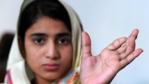 Malala vows to fight on as she shares Nobel Peace Prize