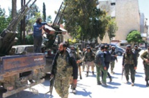 Syrian troops battle to free trapped forces: monitor Syrian troops battle to free trapped forces: monitor
