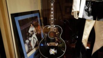 Beatles guitar headlines NY music auction Beatles guitar headlines NY music auction