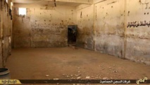 IS destroys infamous Syria prison as regime bombing kills scores