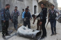Barrel bombs kill 11 civilians in IS town in Syria Barrel bombs kill 11 civilians in IS town in Syria