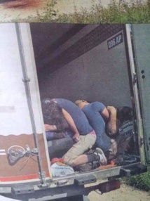 Four held over Austria truck tragedy as migrant deaths mount Four held over Austria truck tragedy as migrant deaths mount