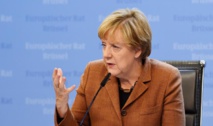Merkel says Assad must be involved in Syria talks