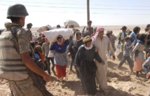 Tens of thousands flee new Syria offensives Tens of thousands flee new Syria offensives