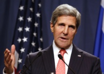 Kerry visits Iraq to back crisis-hit government