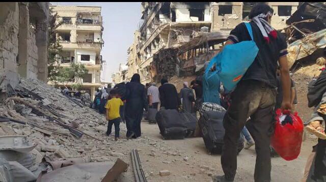 Evacuation begins from Daraya, symbol of Syria revolt