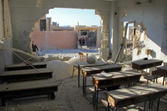 Russia denies role in bloody strike on Syria school
